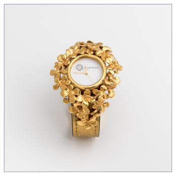 Reloj "Ramitos" bañado en oro